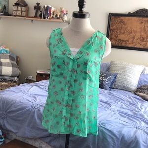 Sleeveless green daisy shirt, never worn
